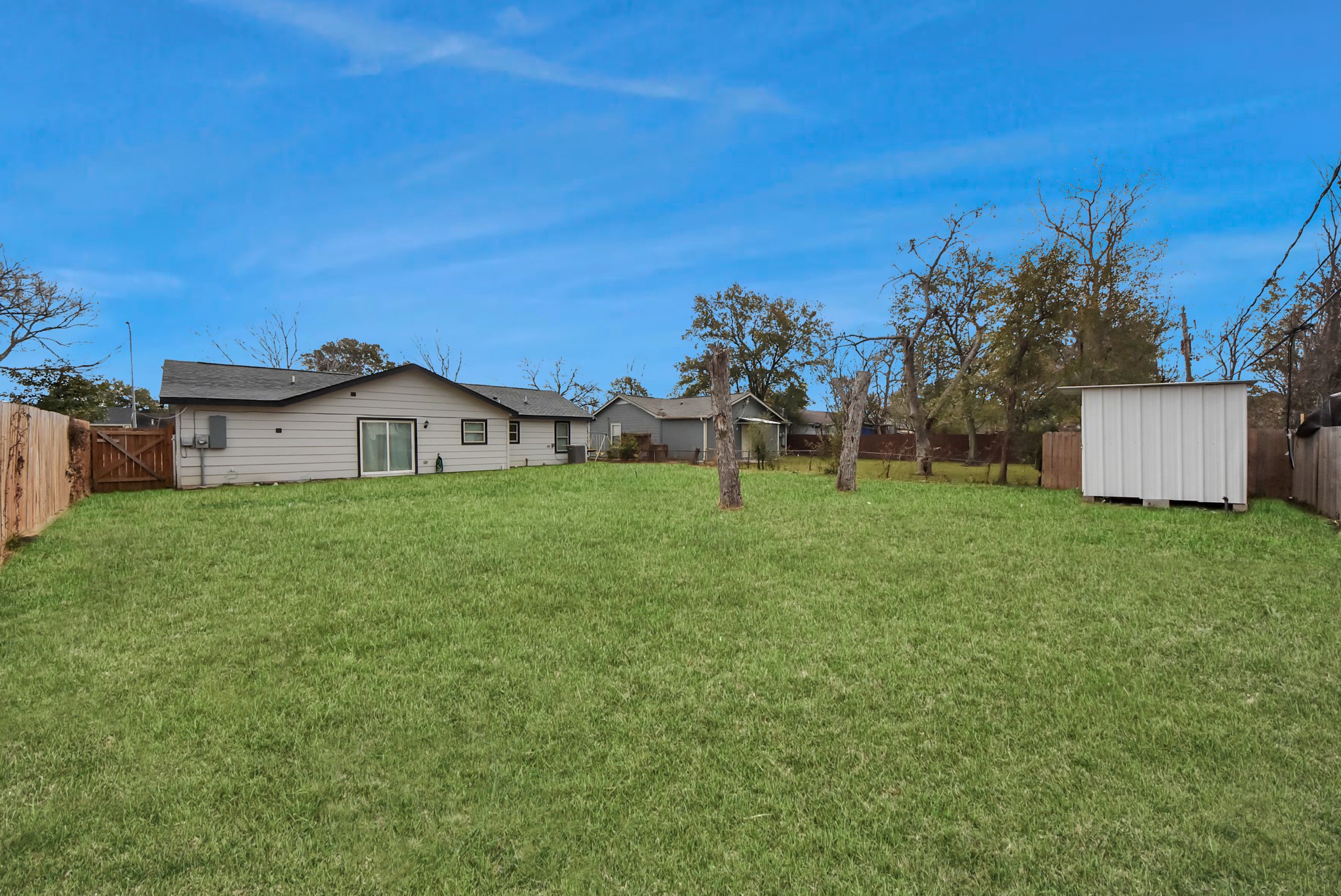 1110 Johnson Street Pasadena, TX 77506 - Photo 30 of 36 a view of a house with a yard