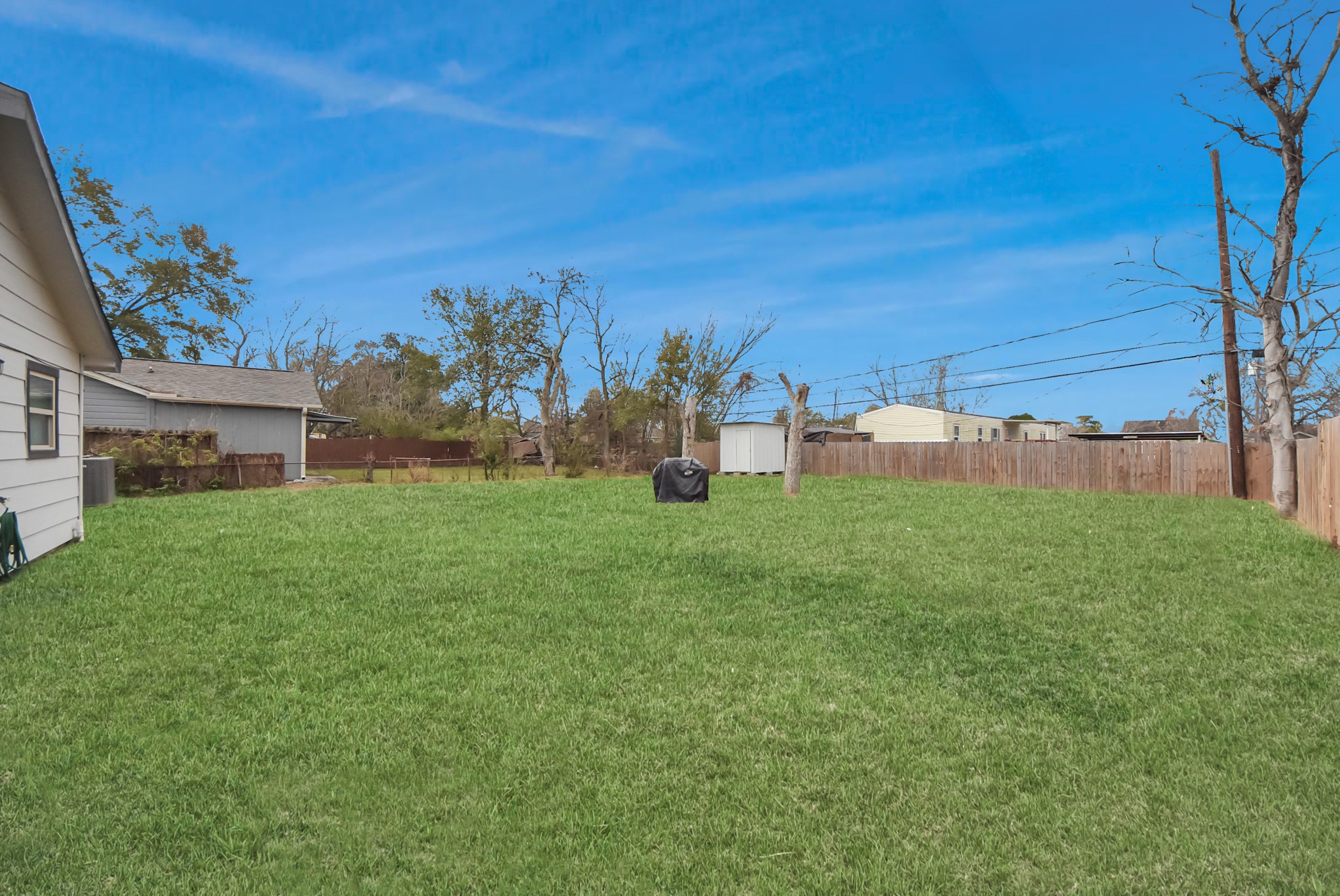 1110 Johnson Street Pasadena, TX 77506 - Photo 31 of 36 a front view of a house with garden