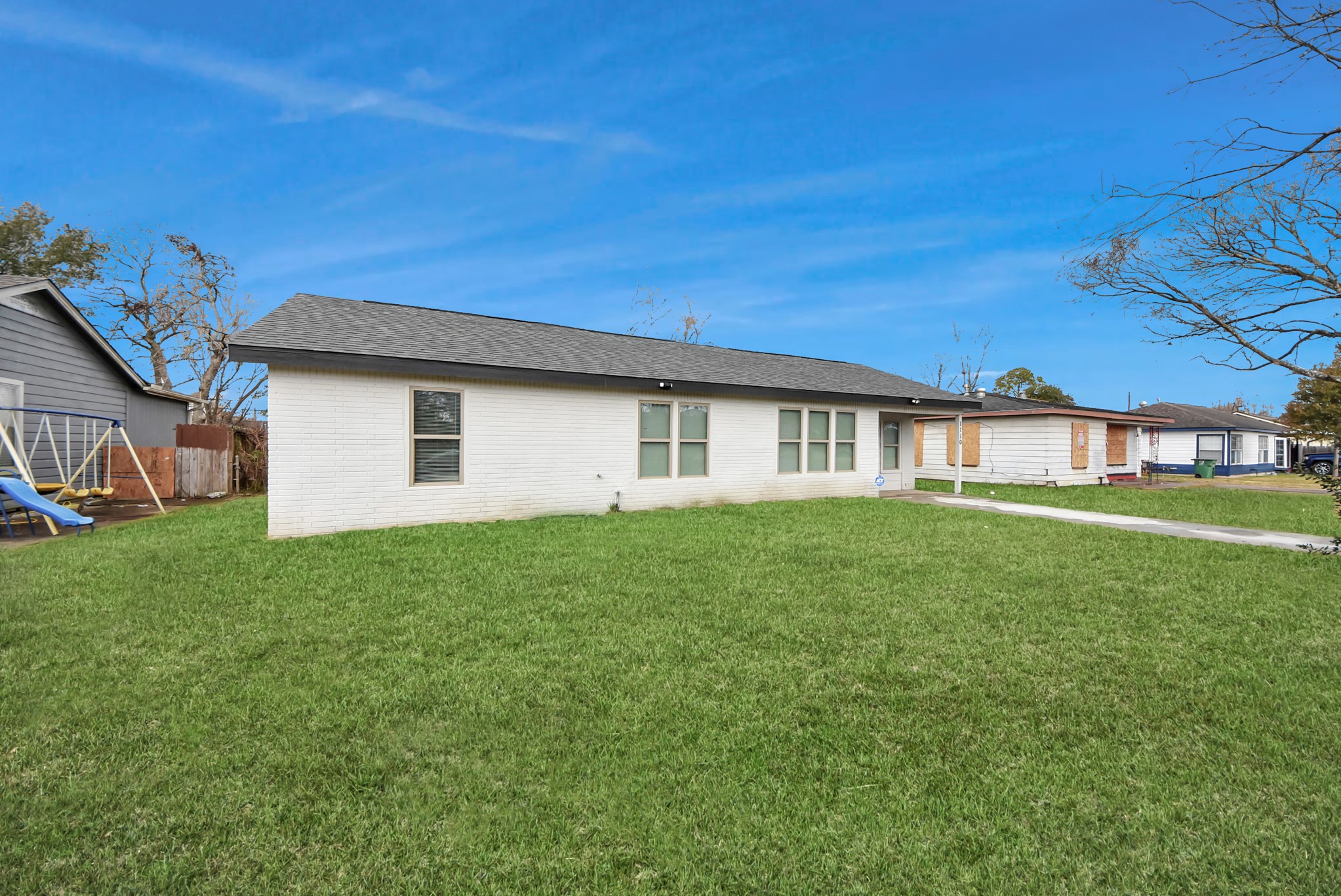 1110 Johnson Street Pasadena, TX 77506 - Photo 32 of 36 a view of a house with a backyard