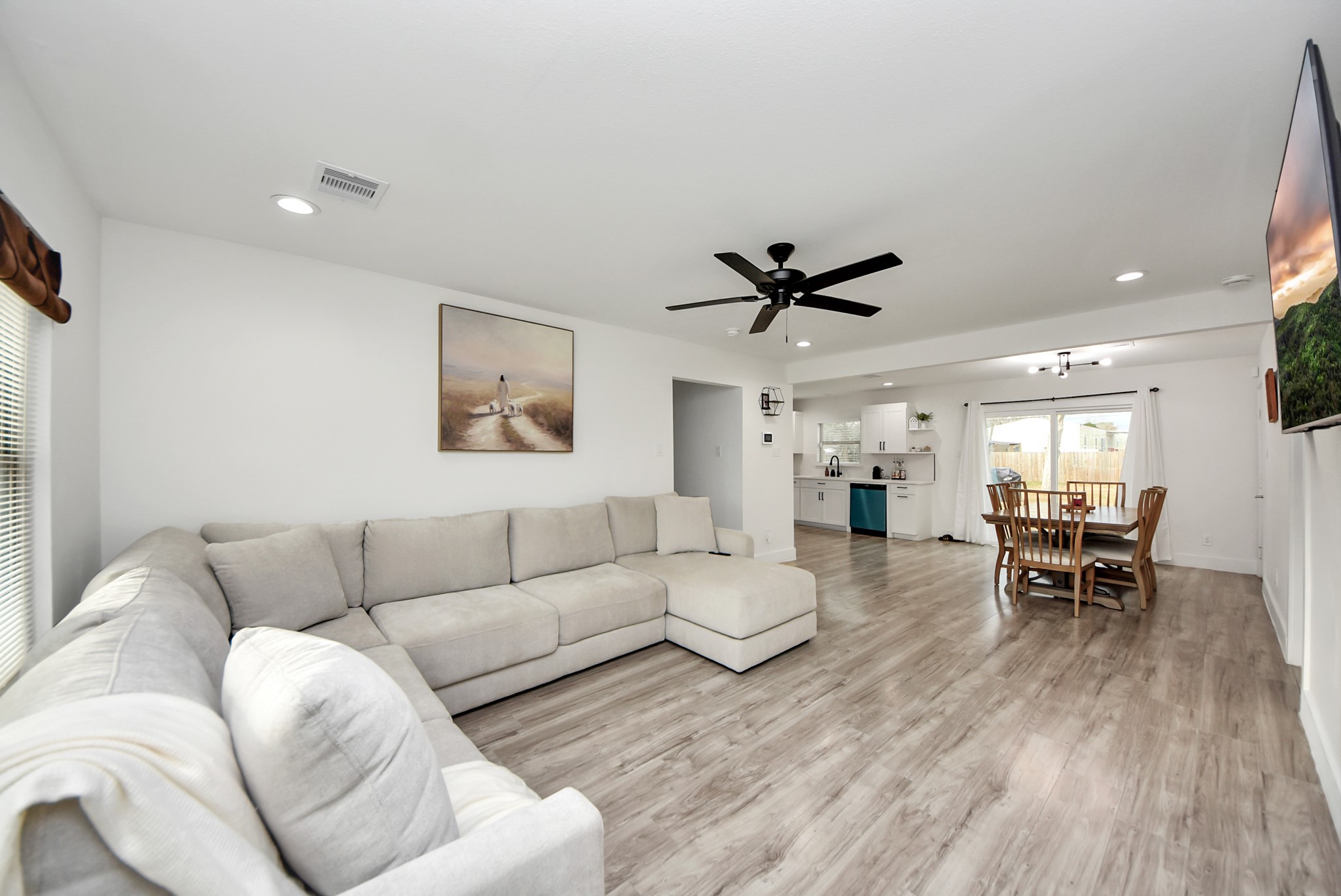 1110 Johnson Street Pasadena, TX 77506 - Photo 8 of 36 a living room with furniture and a wooden floor