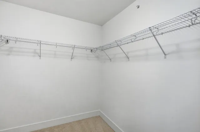a view of a room with racks on the wall