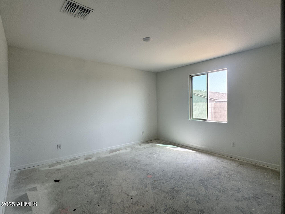 15793 West Beryl Avenue Waddell, AZ 85355 - Photo 14 of 34 an empty room with windows