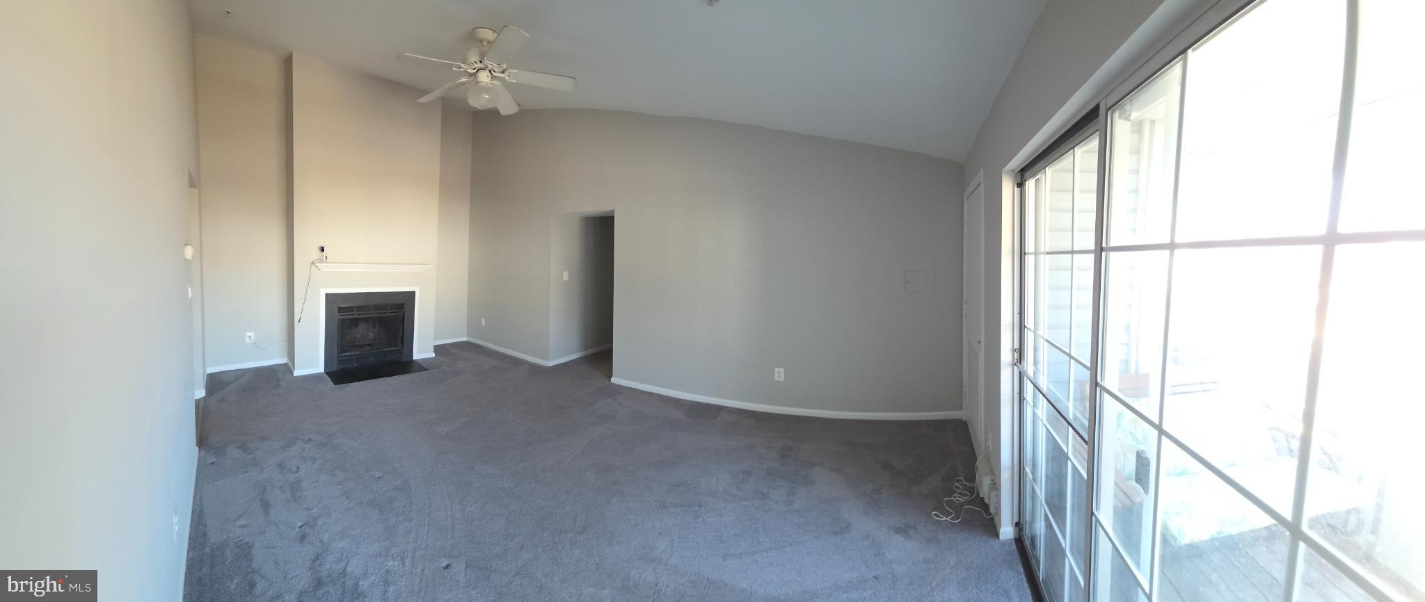8343 Montgomery Run Road Ellicott City, MD 21043 - Photo 2 of 36 Spacious living area with natural light.