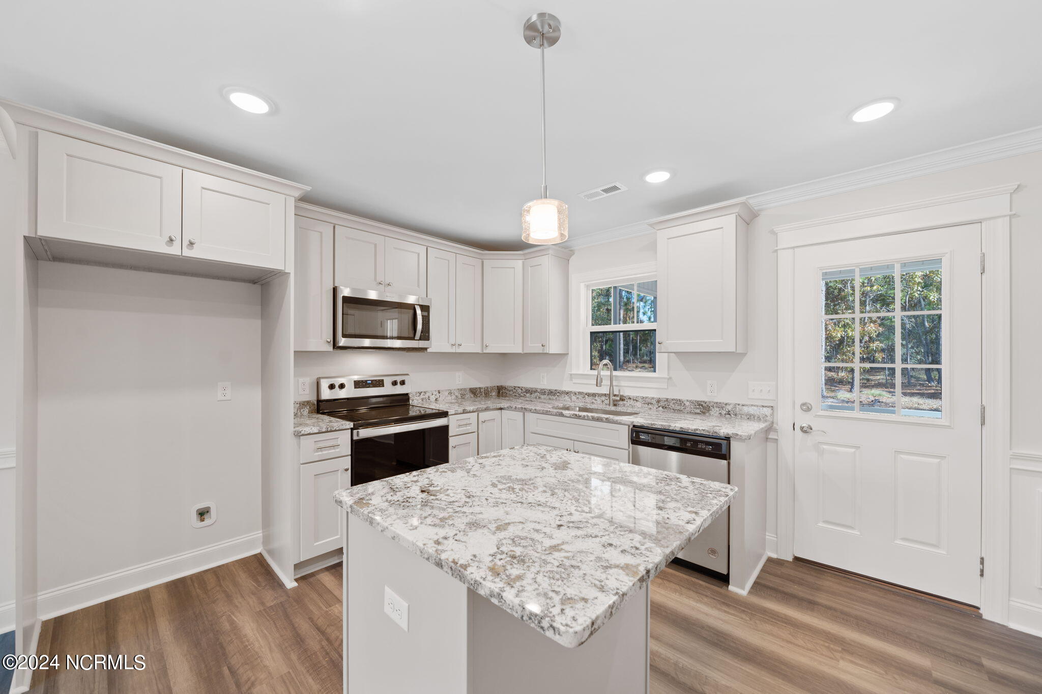 2213 Meadowood Road Southport, NC 28461 - Photo 7 of 33 7-web-or-mls-868 Nicklaus Rd 7