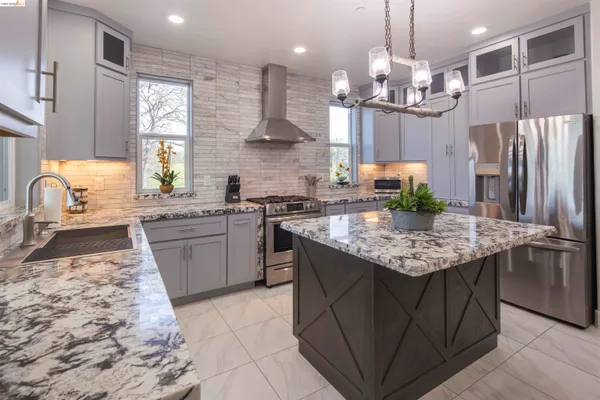 a kitchen with a table and chairs in it
