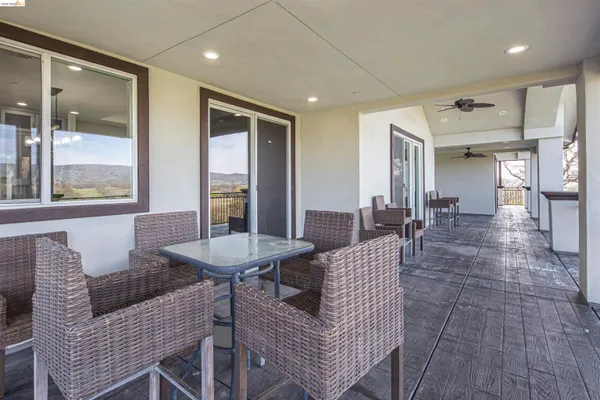 a view of a porch with furniture