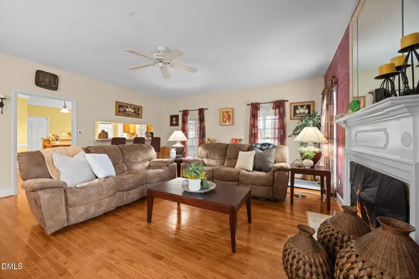 a work room with furniture and wooden floor