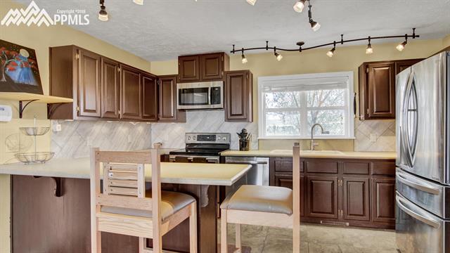 13850 Canter Road Peyton, CO 80831 - Photo 8 of 20 Gallery Image 8