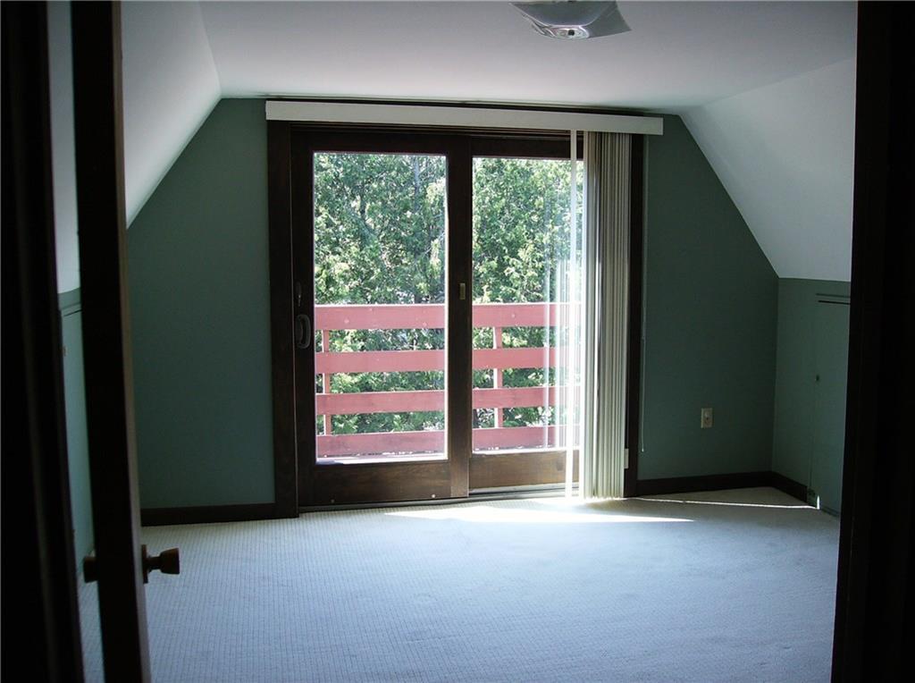 489 Smithfield Road Belgrade, ME 04917 - Photo 12 of 34 Upstairs bedroom also has deck.