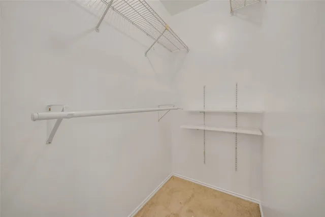 a view of a room with racks on the wall