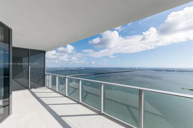 a view of balcony with furniture
