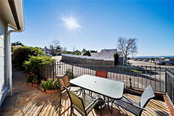 swimming pool view with a seating space