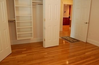 72 Bennett Street, Unit 72 Boston, MA 02135 - Photo 13 of 17 a view of an empty room with closet and utility room