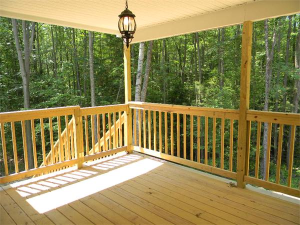 245 Tom Swamp Road Petersham, MA 01366 - Photo 7 of 14 a view of a wooden deck