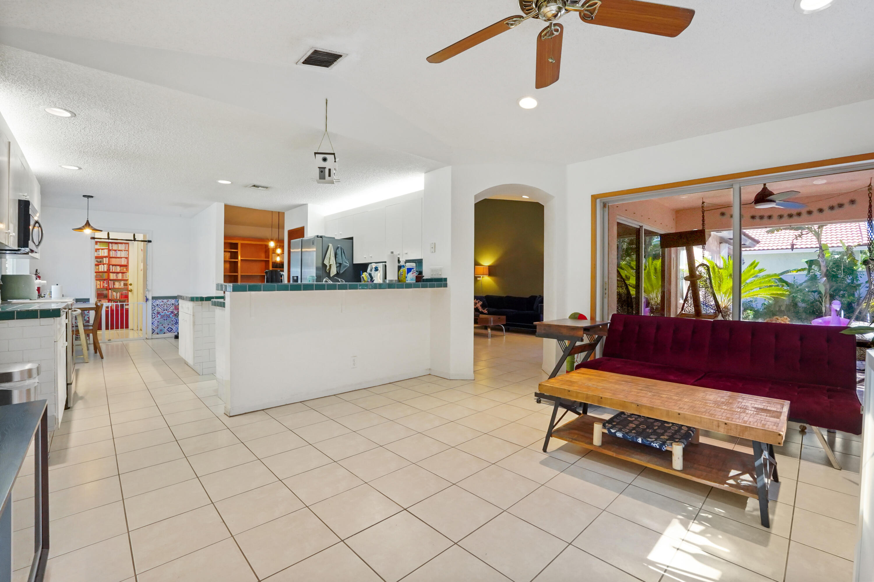132 West Lee Road Delray Beach, FL 33445 - Photo 14 of 41 a living room with furniture and a flat screen tv