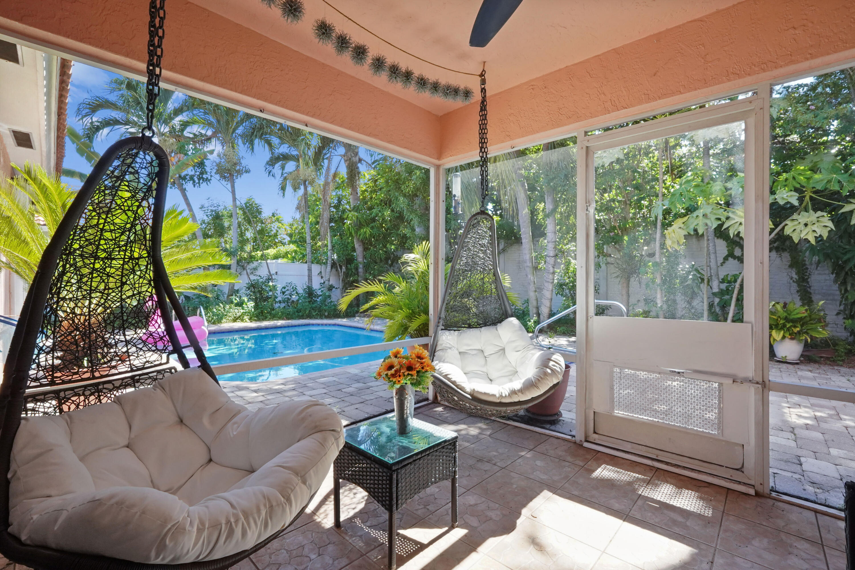 132 West Lee Road Delray Beach, FL 33445 - Photo 35 of 41 a building outdoor space with patio furniture and potted plants