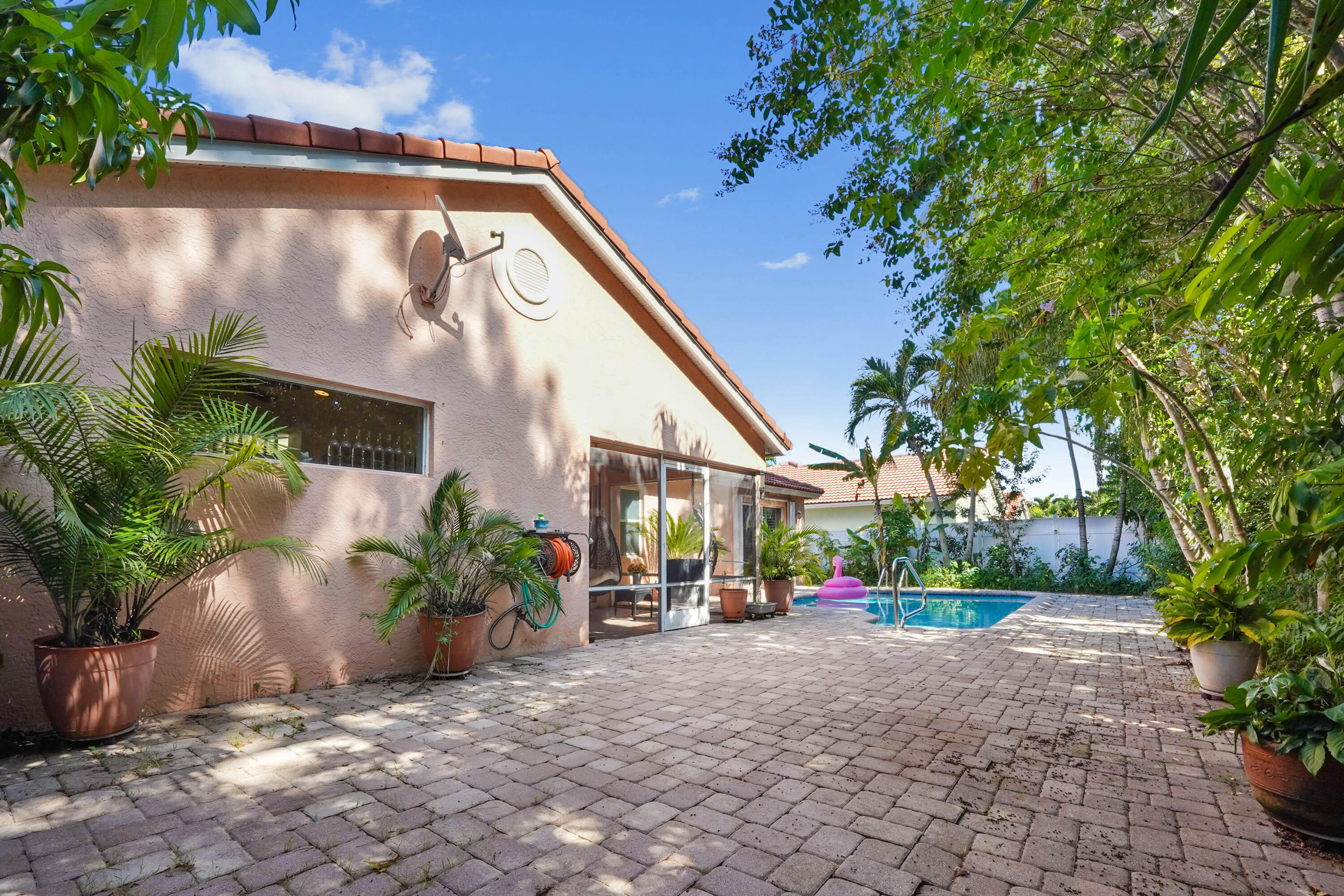 132 West Lee Road Delray Beach, FL 33445 - Photo 37 of 41 a view of an house with backyard and garden
