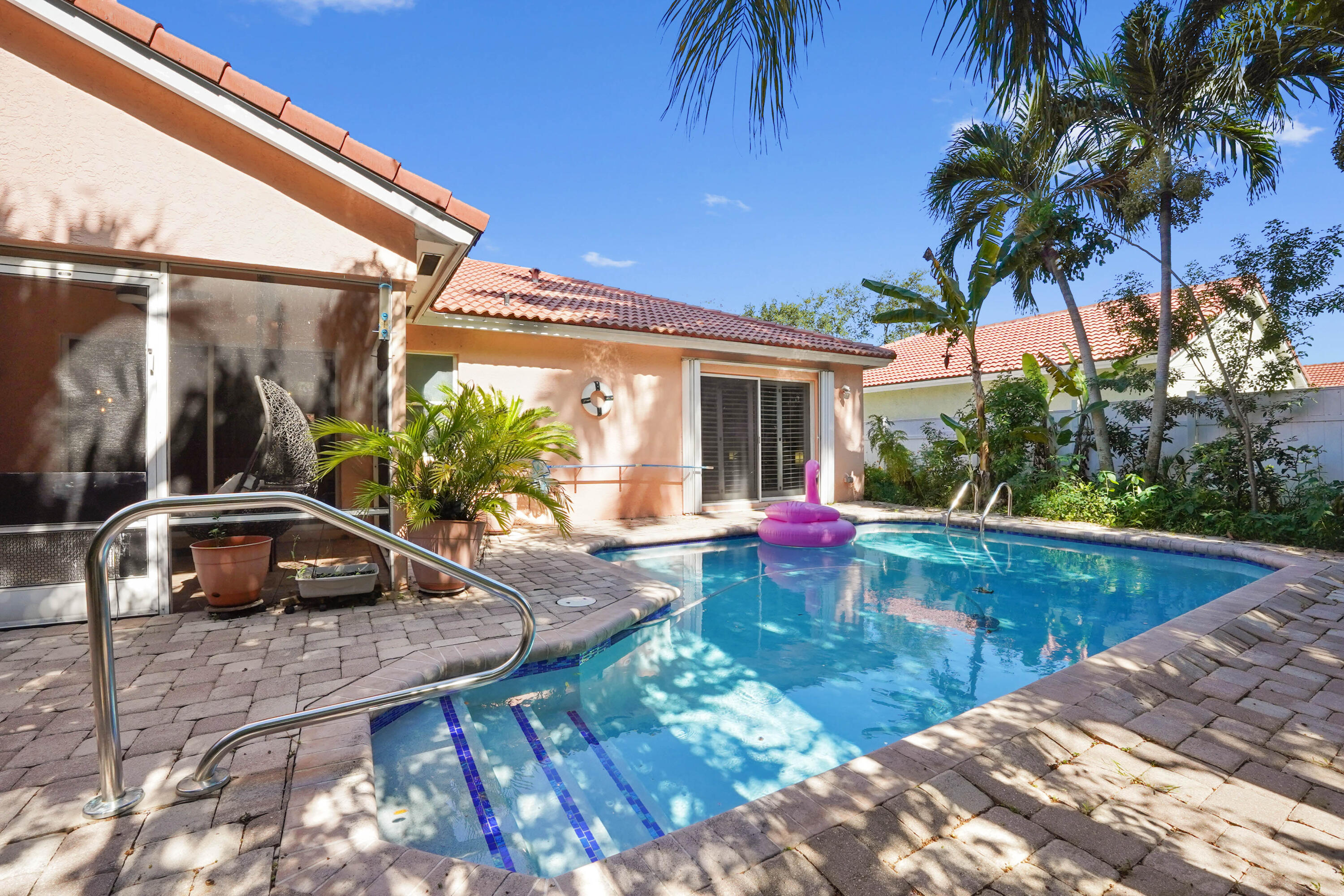 132 West Lee Road Delray Beach, FL 33445 - Photo 38 of 41 a view of a house with pool