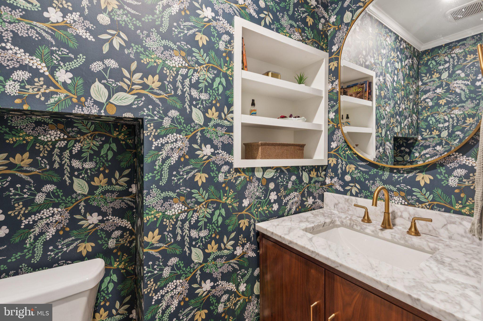 429 Gaskill Street Philadelphia, PA 19147 - Photo 24 of 63 a bathroom with a sink and a mirror