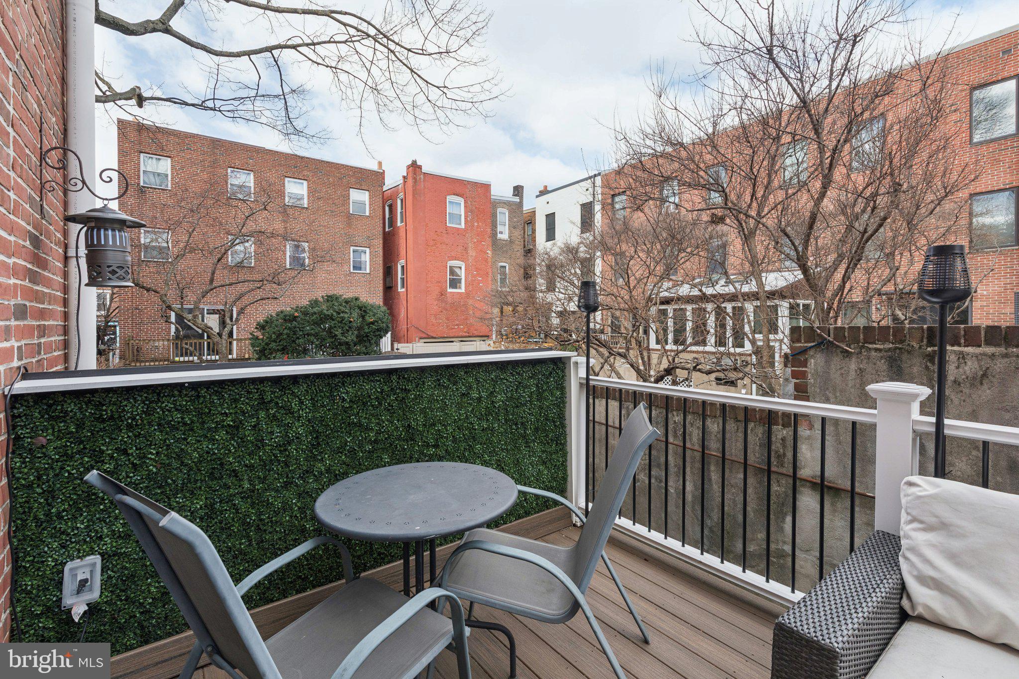 429 Gaskill Street Philadelphia, PA 19147 - Photo 28 of 63 a view of a chairs and a table in the balcony