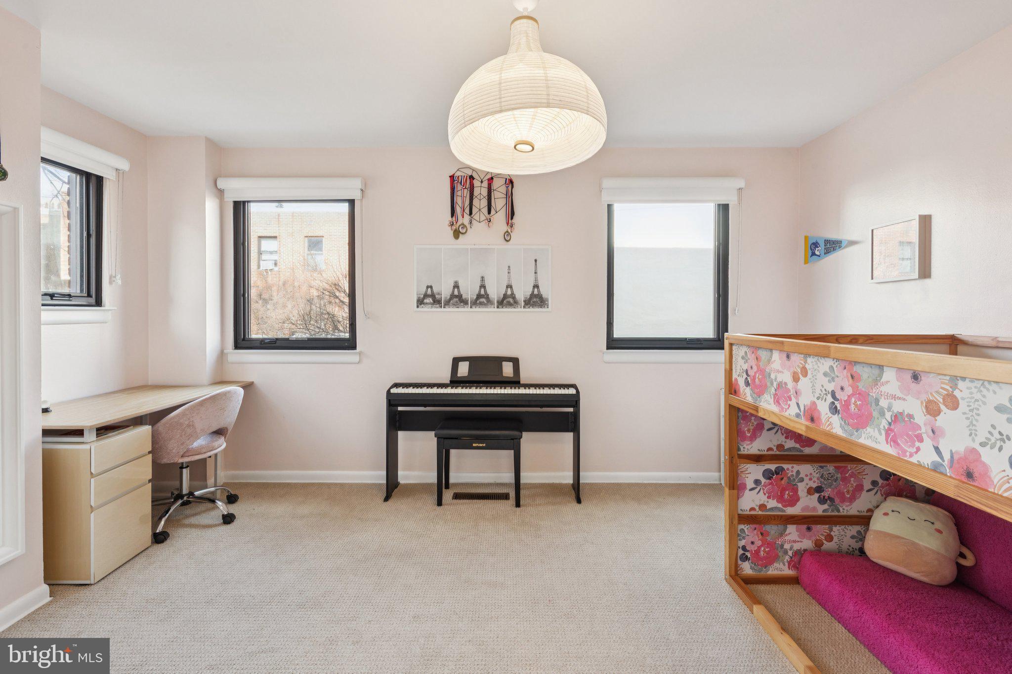 429 Gaskill Street Philadelphia, PA 19147 - Photo 47 of 63 a view of a livingroom with furniture and windows