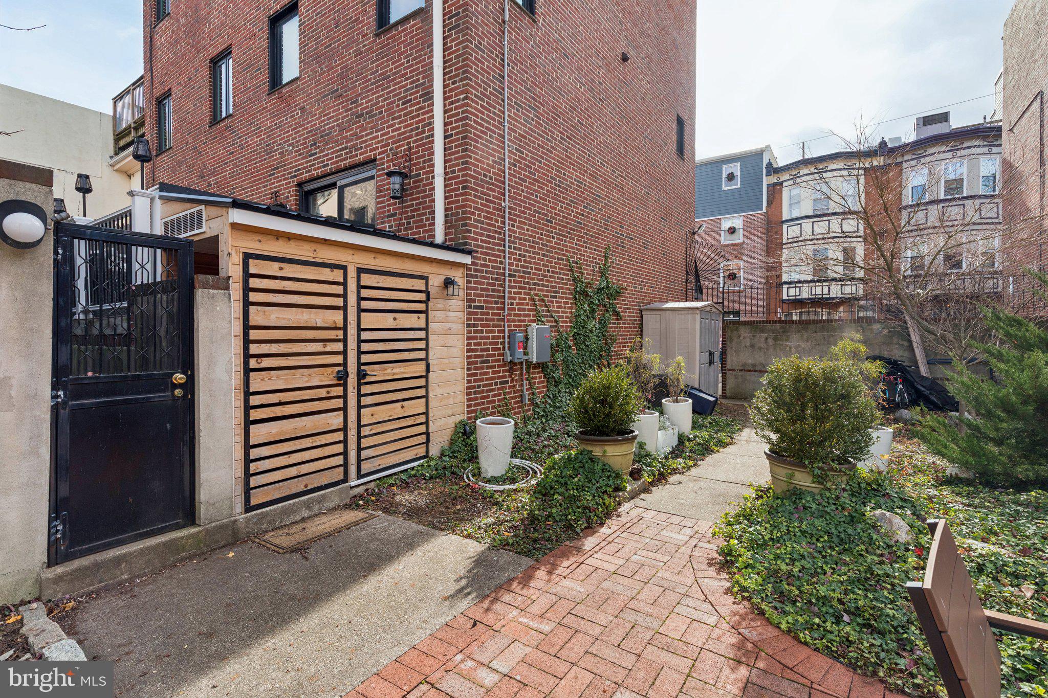 429 Gaskill Street Philadelphia, PA 19147 - Photo 60 of 63 a front view of a house with a yard