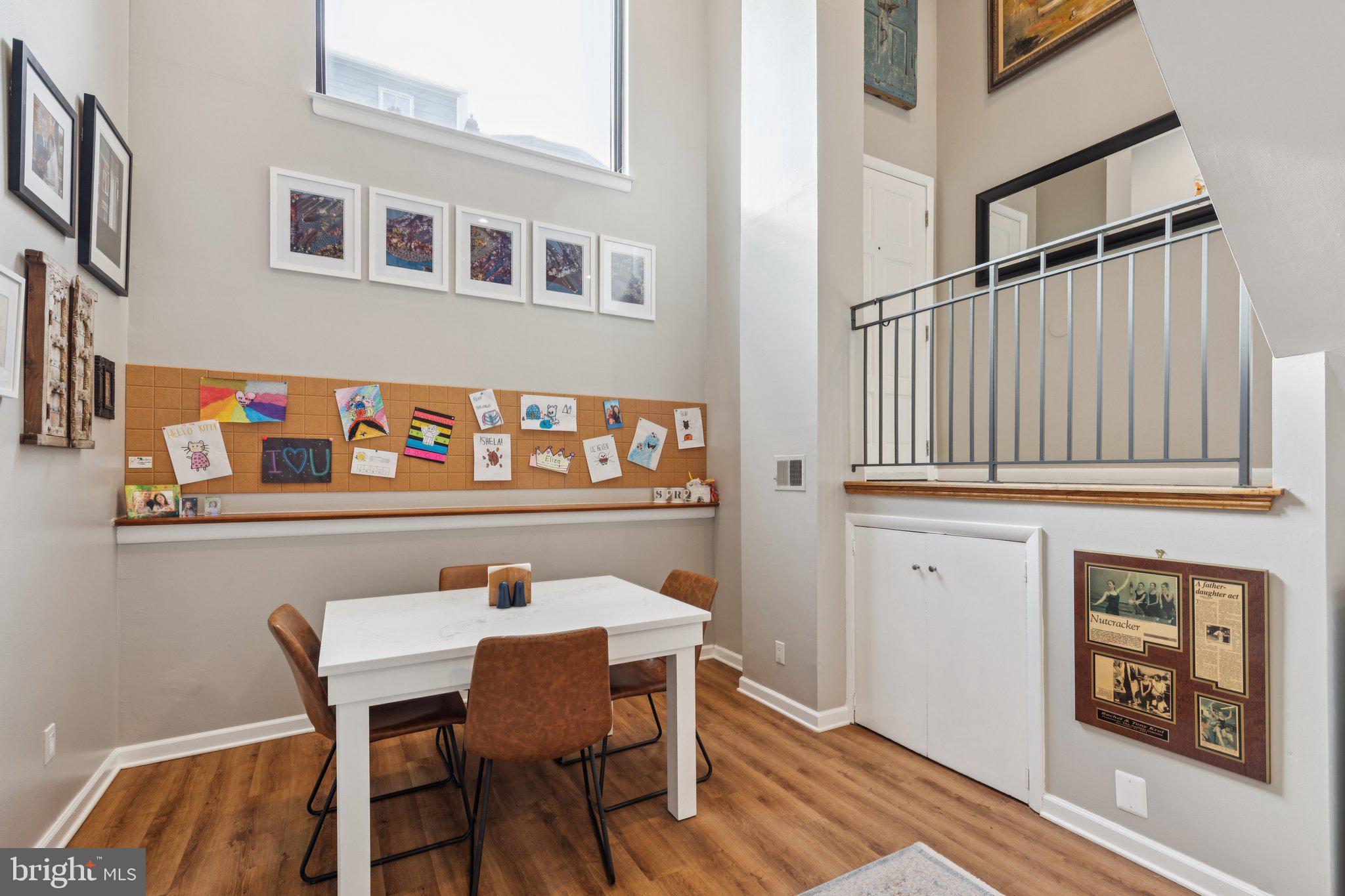 429 Gaskill Street Philadelphia, PA 19147 - Photo 6 of 63 a dining room with furniture and wooden floor