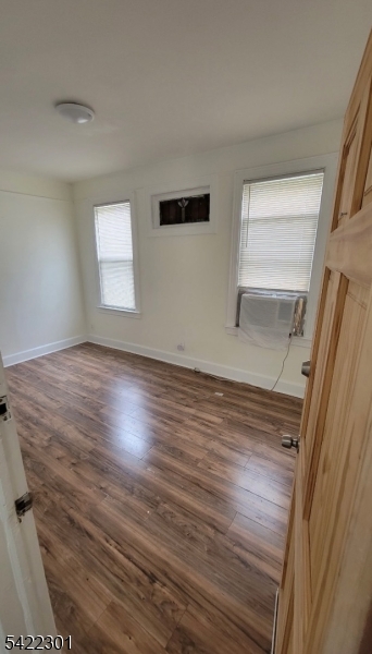 569 Morris Street Orange, NJ 07050 - Photo 7 of 10 a view of room and wooden floor