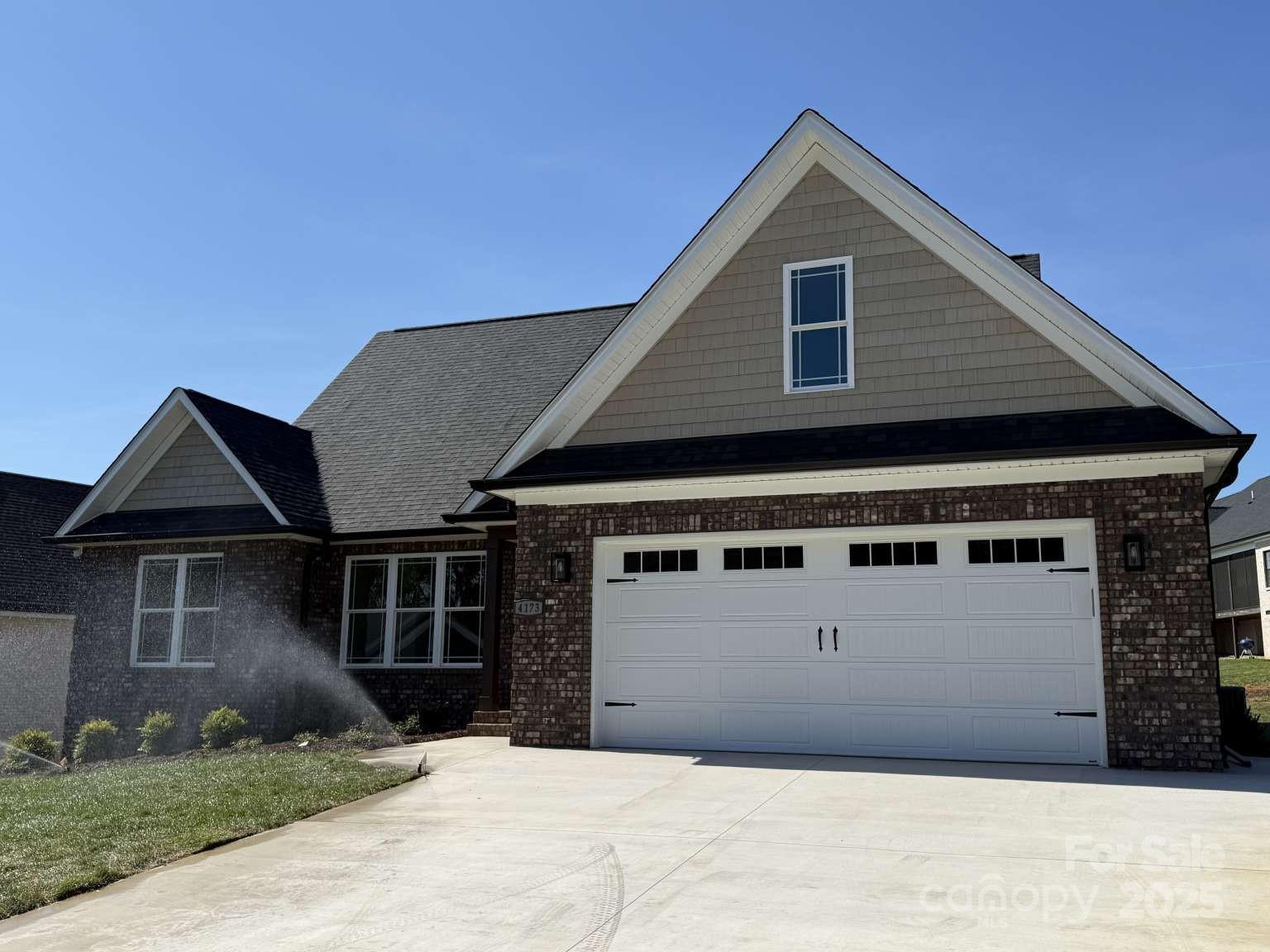 4173 Holly Circle Northeast Conover, NC 28613 - Photo 2 of 40 a front view of a house with garage