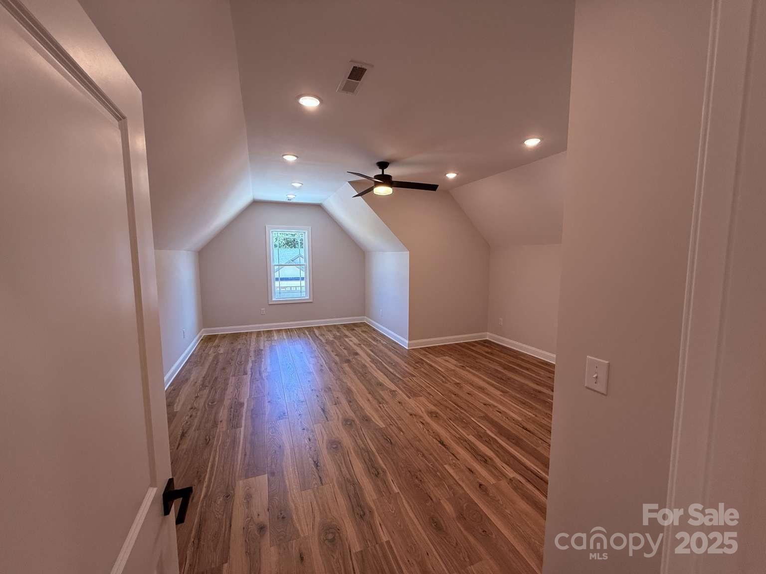 4173 Holly Circle Northeast Conover, NC 28613 - Photo 23 of 40 a view of empty room with wooden floor