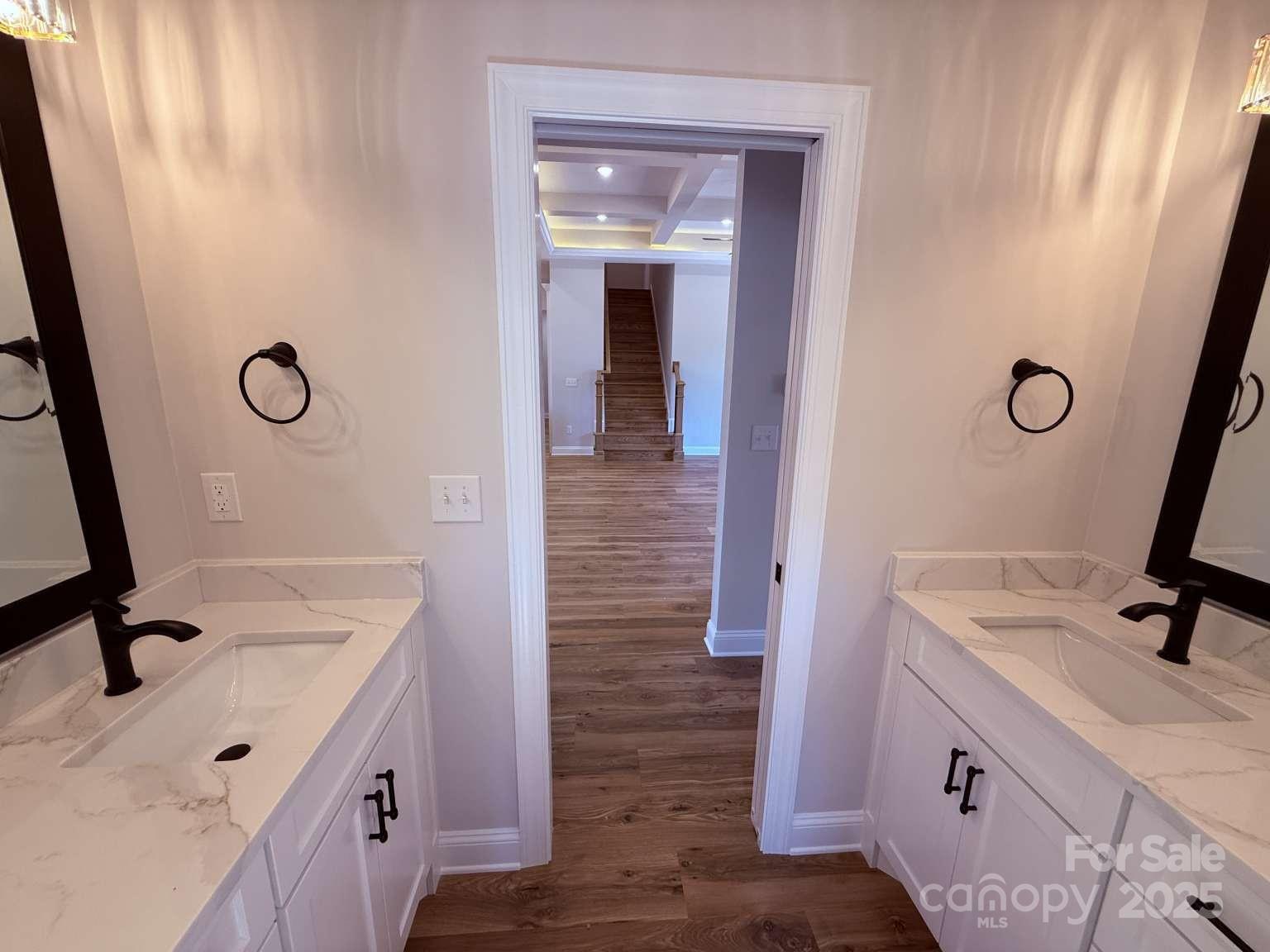 4173 Holly Circle Northeast Conover, NC 28613 - Photo 30 of 40 a bathroom with a sink a vanity and a mirror