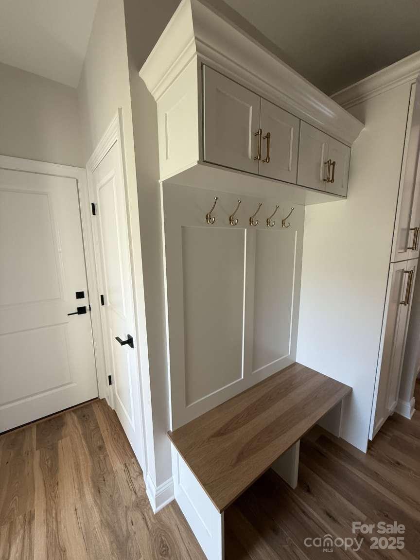 4173 Holly Circle Northeast Conover, NC 28613 - Photo 34 of 40 a view of a hallway with wooden floor and staircase