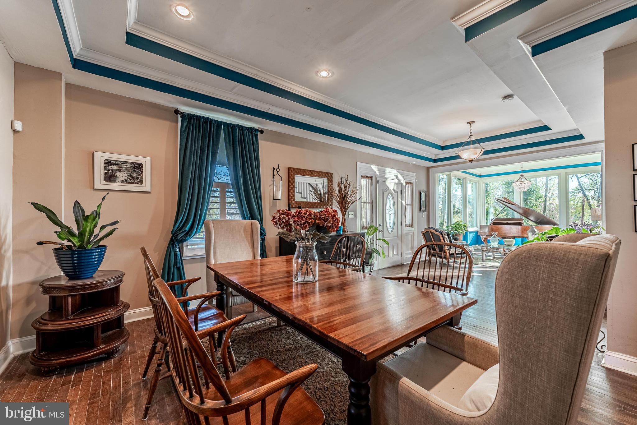 2600 Queen Anne Road Baltimore, MD 21216 - Photo 7 of 28 a view of a dining room with furniture window and wooden floor