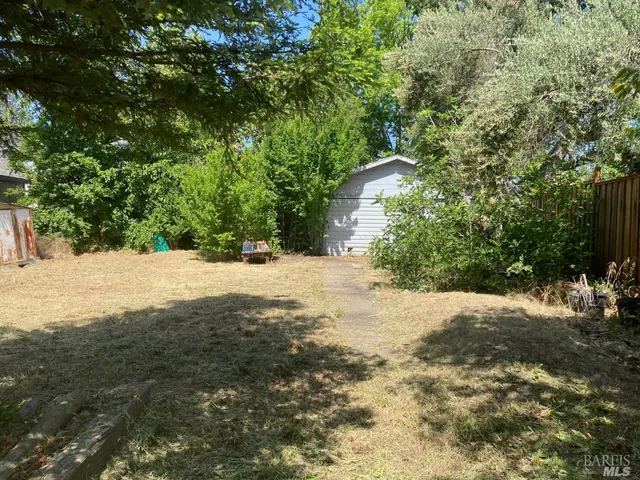a house with trees in front of it