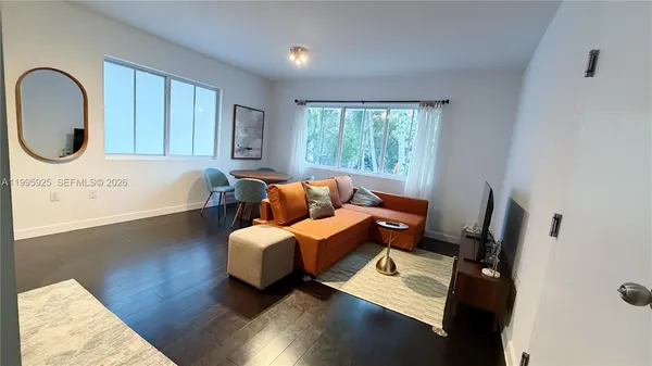 a bed room with a bed furniture and a window