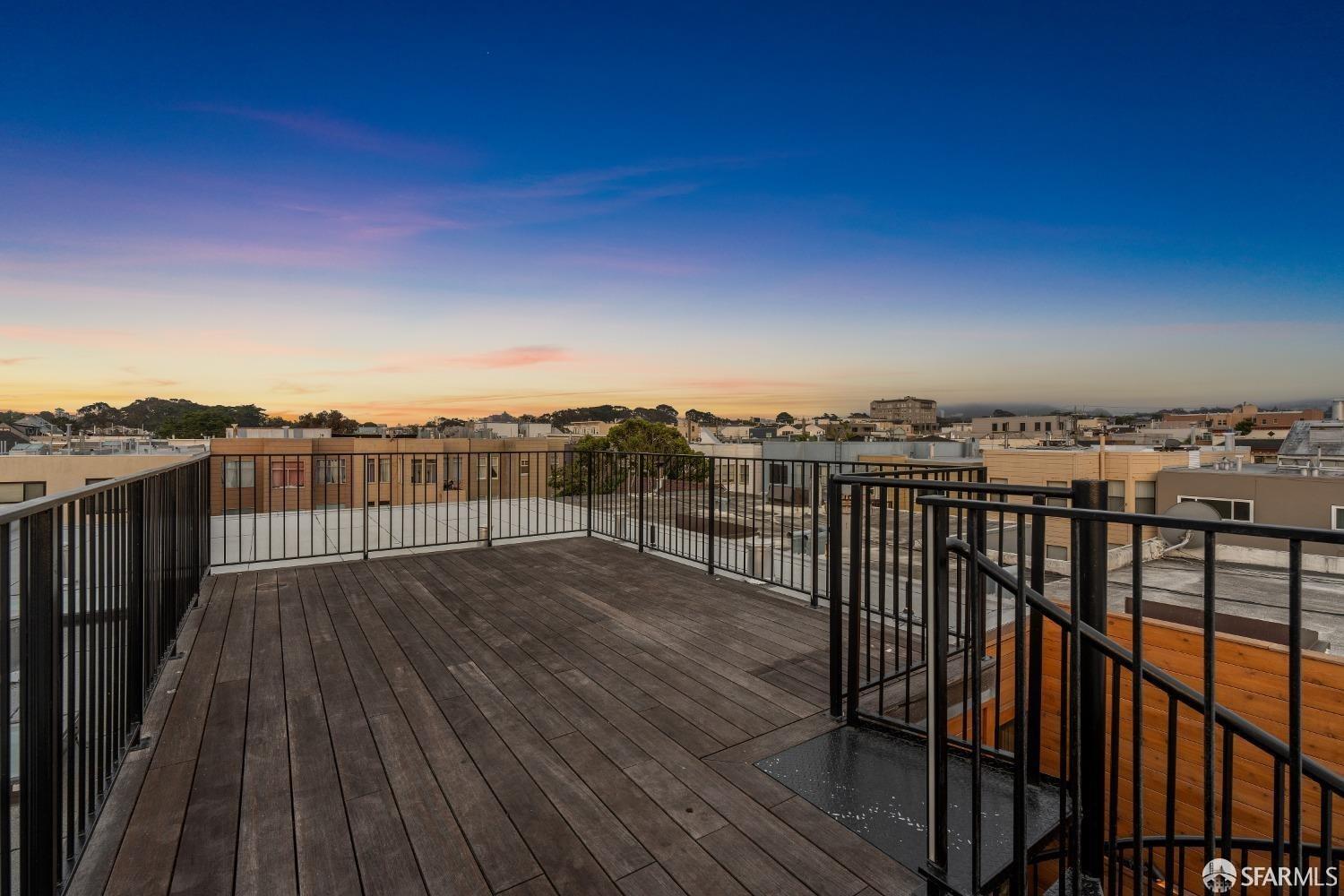 174-172 18th Avenue, Unit 172 San Francisco, CA 94121 - Photo 28 of 37 a view of a balcony with an ocean view