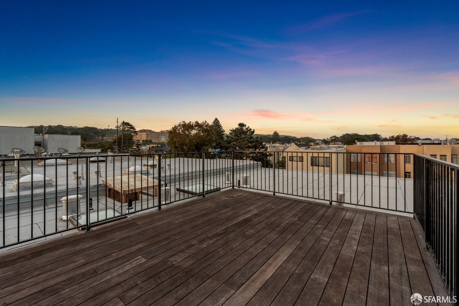 174-172 18th Avenue, Unit 172 San Francisco, CA 94121 - Photo 29 of 37 a view of balcony with wooden floor