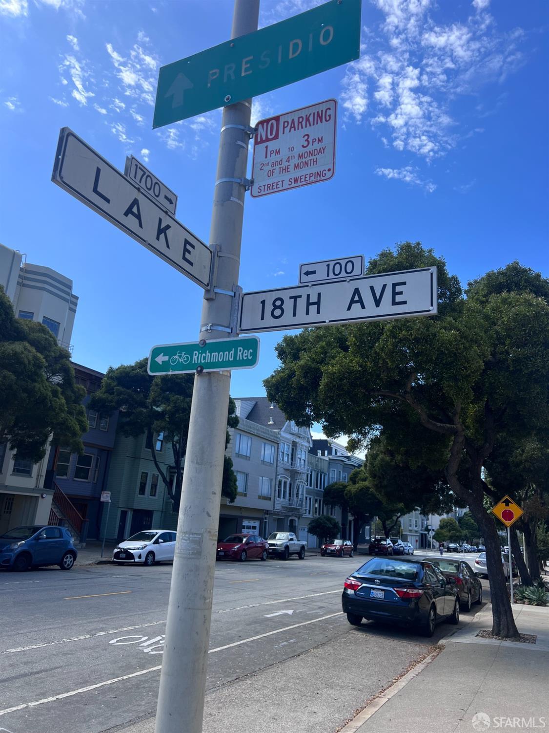 174-172 18th Avenue, Unit 172 San Francisco, CA 94121 - Photo 31 of 37 a view of a car parked in front of a building