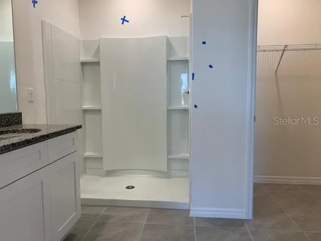 a view of a room with racks on the wall