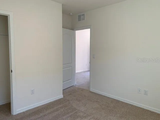 a view of a kitchen with windows