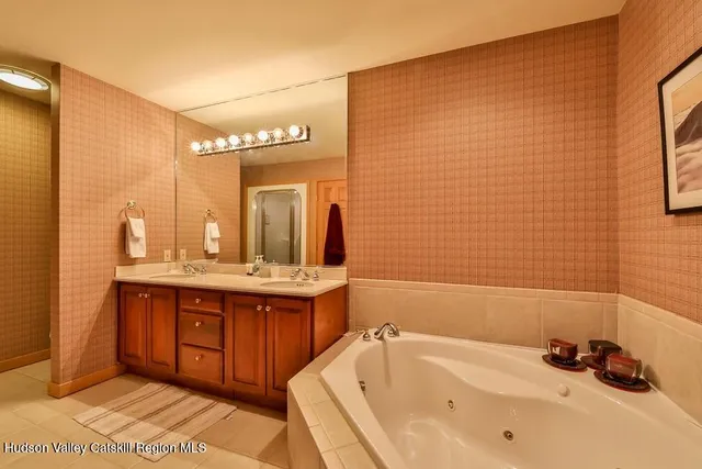 a bedroom with a bed and a cabinets