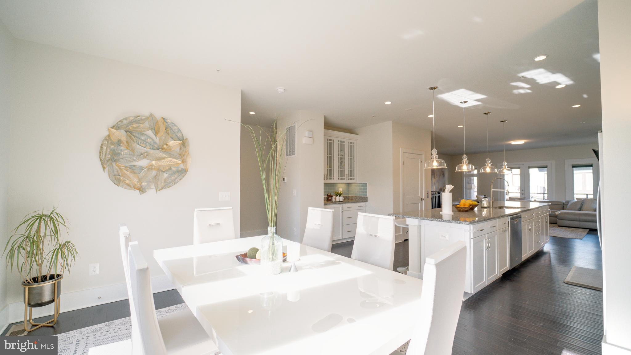 20062 Old Line Terrace Ashburn, VA 20147 - Photo 18 of 79 a large white kitchen with a large window