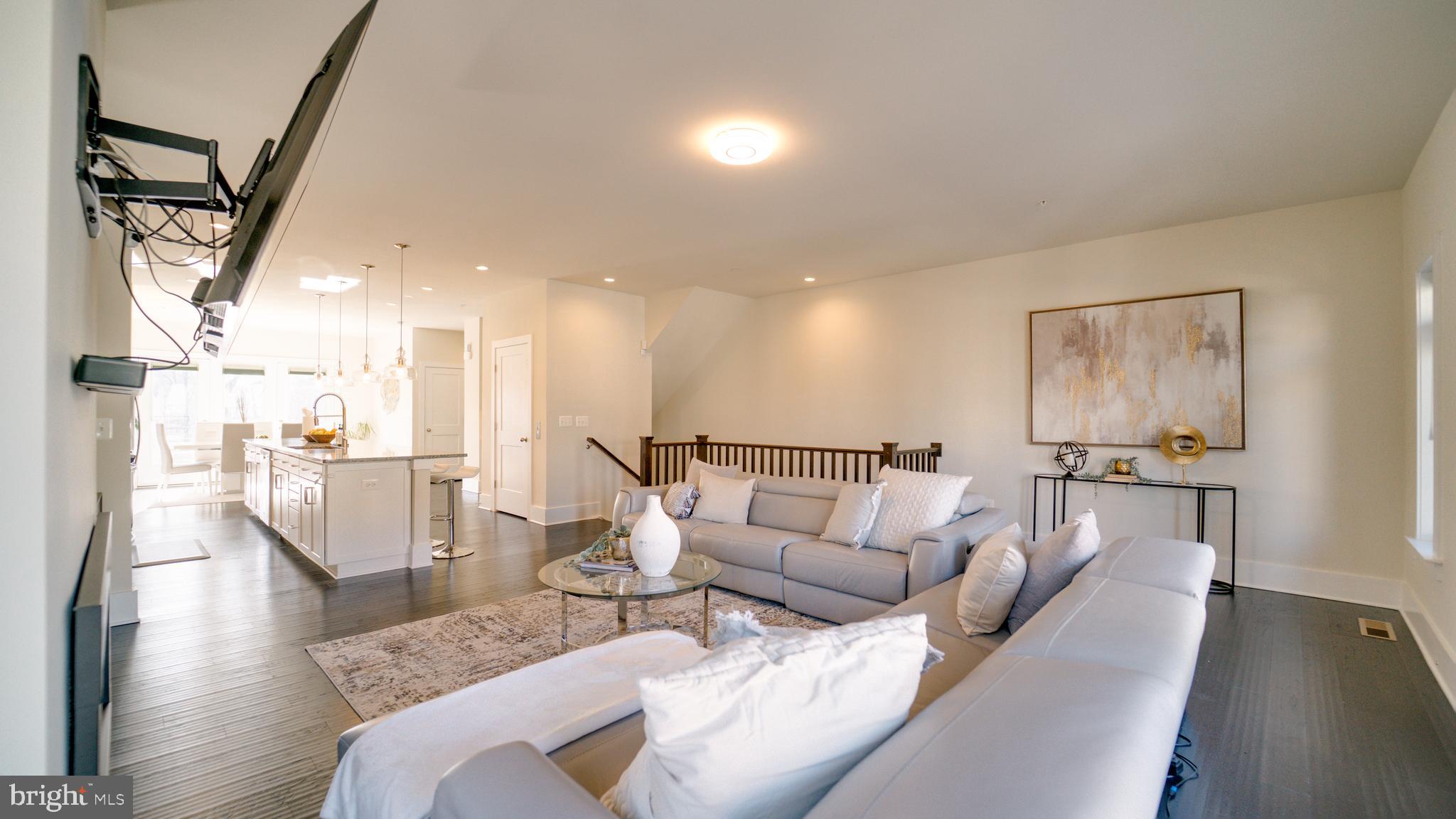 20062 Old Line Terrace Ashburn, VA 20147 - Photo 25 of 79 a living room with furniture and a table