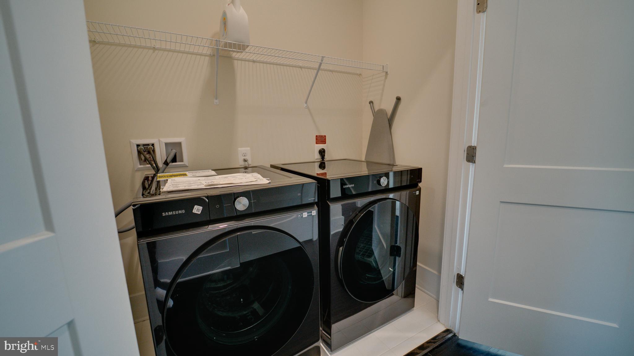 20062 Old Line Terrace Ashburn, VA 20147 - Photo 44 of 79 a utility room with dryer and washer