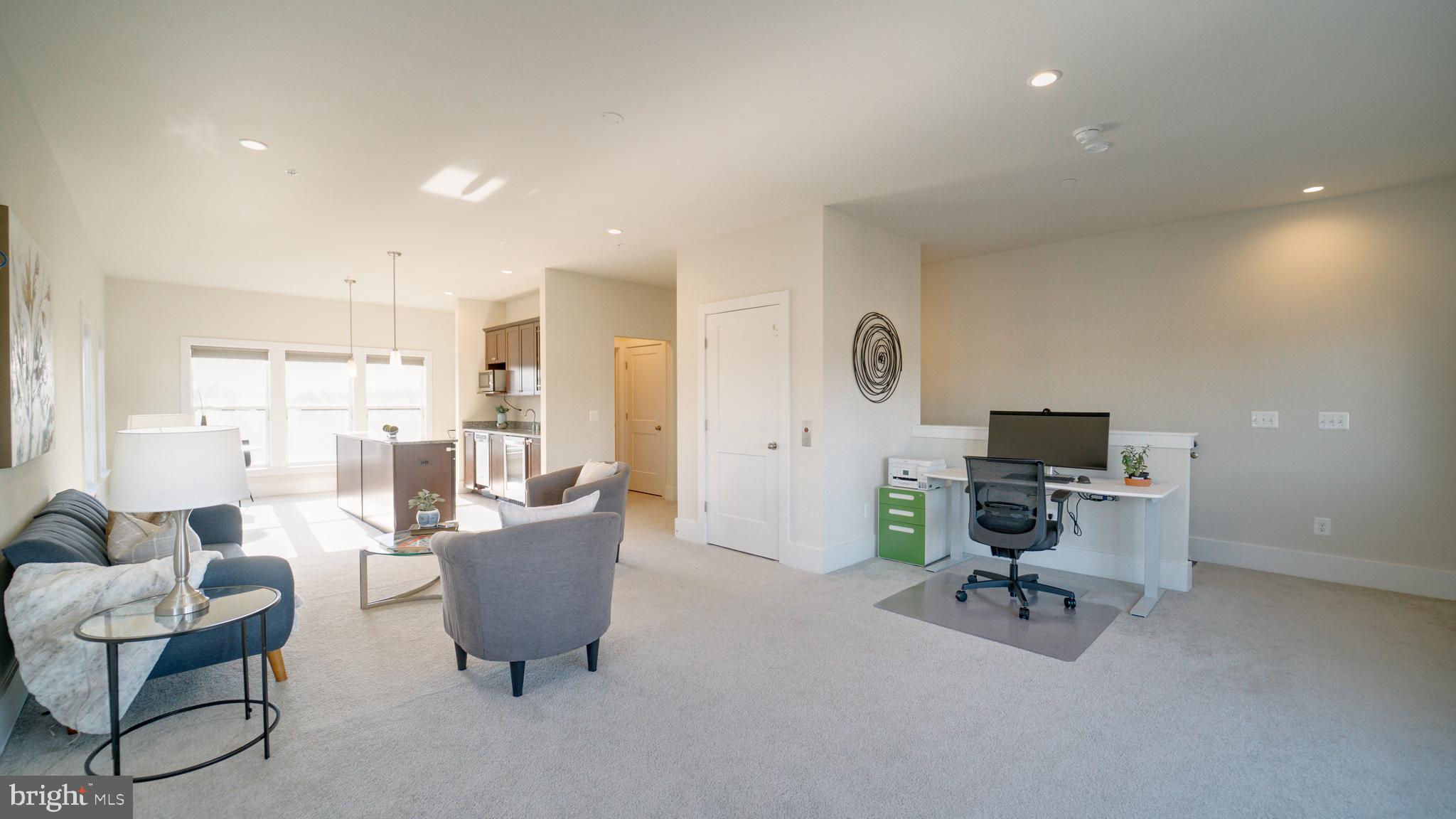 20062 Old Line Terrace Ashburn, VA 20147 - Photo 55 of 79 a living room with furniture and a flat screen tv