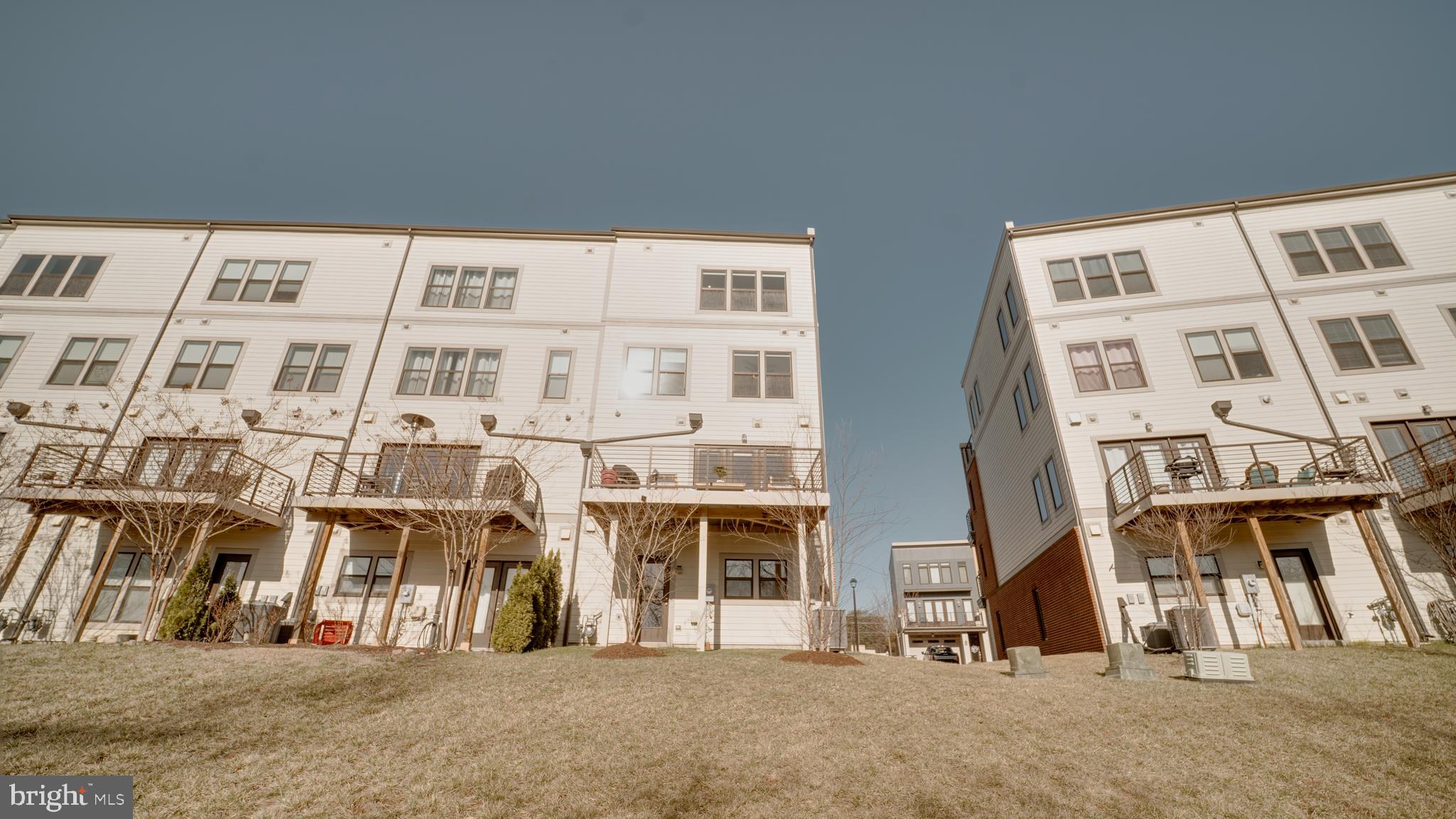 20062 Old Line Terrace Ashburn, VA 20147 - Photo 73 of 79 a large building with a lot of windows