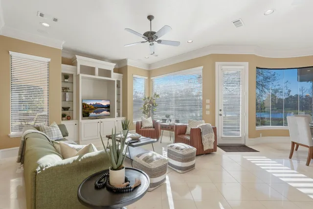 a kitchen with white cabinets and a stainless steel appliances