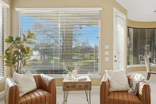 a room with a large window and tub