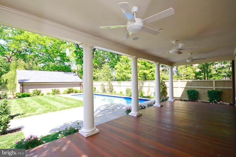 3817 Woodley Road Northwest Washington, DC 20016 - Photo 22 of 28 porch access from kitchen/family room & to pool