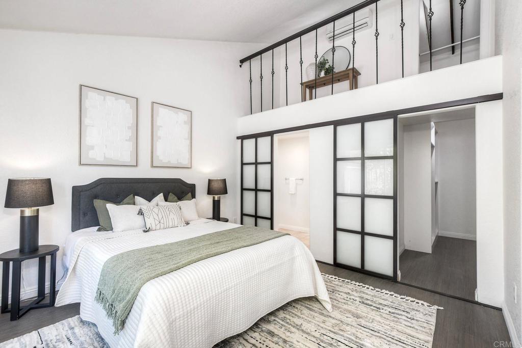 4710 Majorca Way Oceanside, CA 92056 - Photo 17 of 42 Beautiful primary with walk-in closet, custom bathroom & a lovely loft overlooking the bedroom.